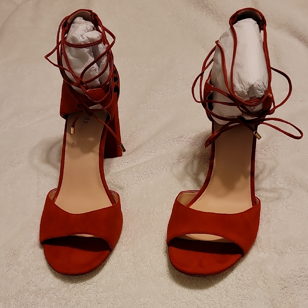 Kate Spade.Suede open toe. 10/1/2m heel 4 Beautiful floral detail on the back.